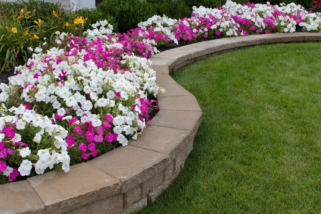 Flower Bed with a minimal retaining wall border - Seaside Oregon